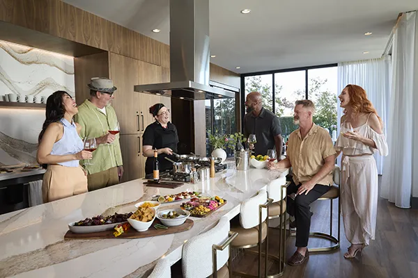 The Astrie residents gathering for a culinary experience in the community kitchen