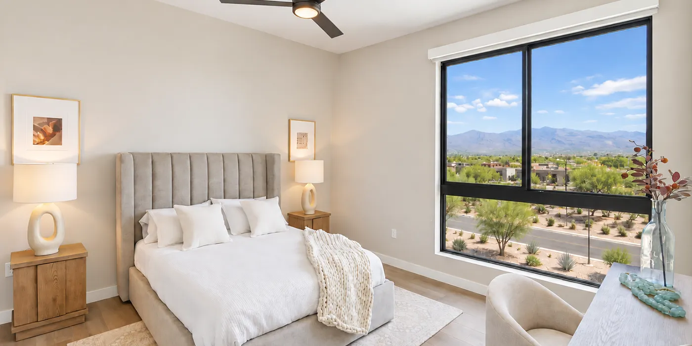 Modern bedroom at The Astrie with expansive windows and Tucson mountain views