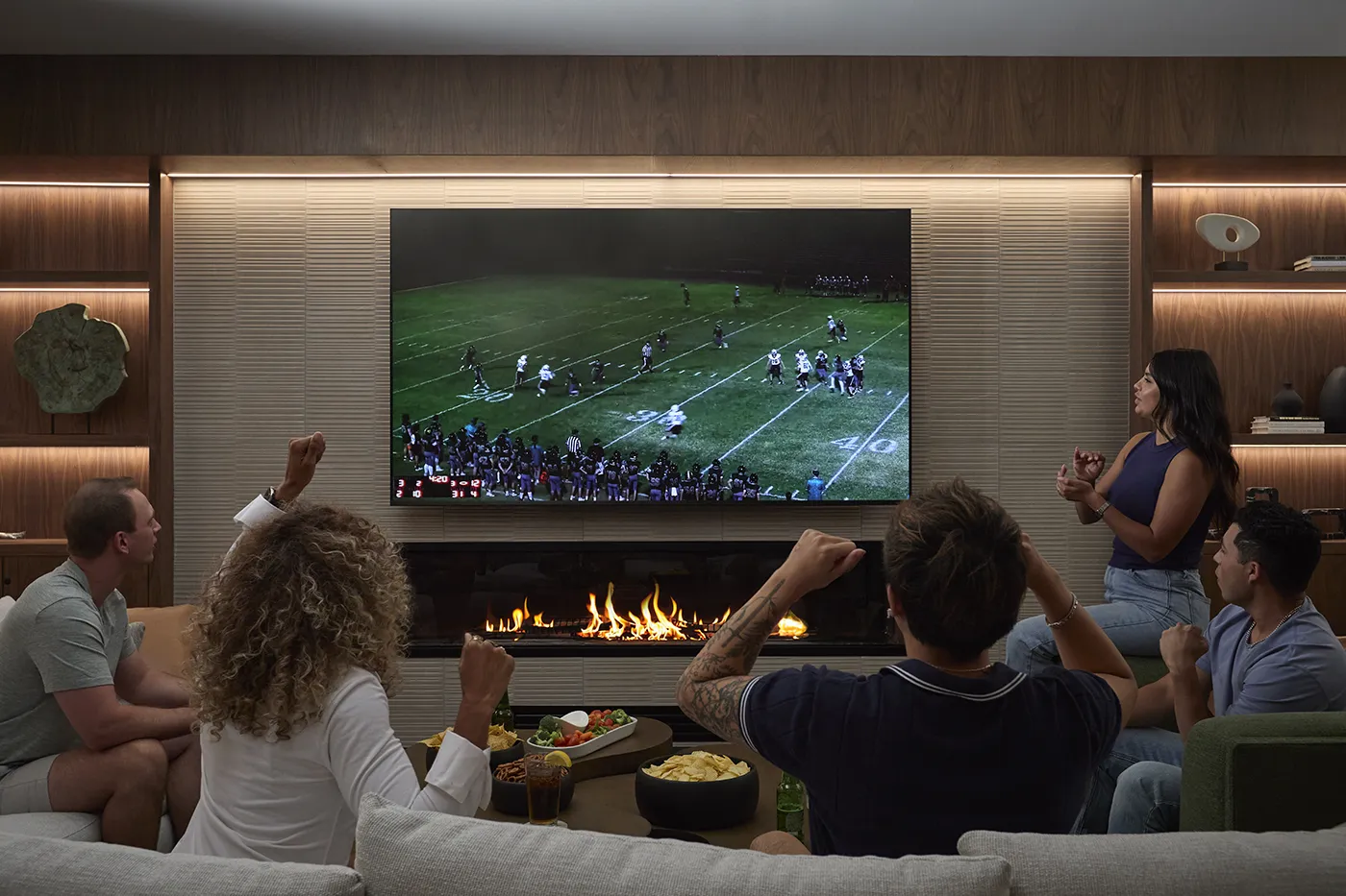 The Astrie residents watching a football game in a luxury community lounge in Tucson